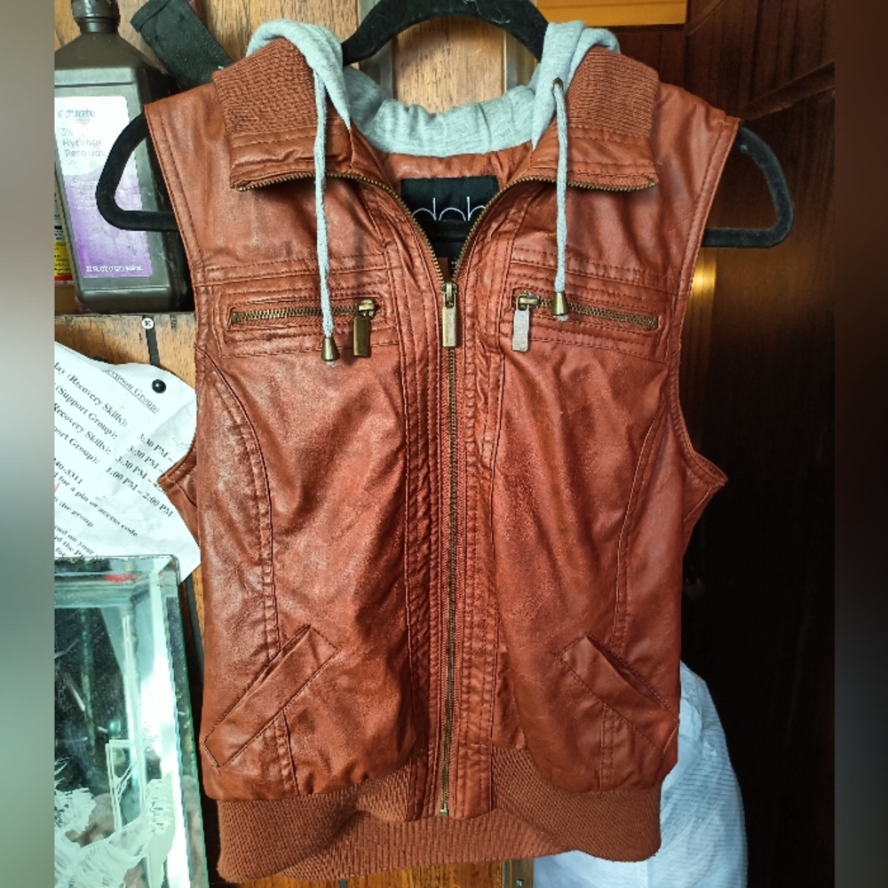 DEB brown faux leather vest with gray hoodie